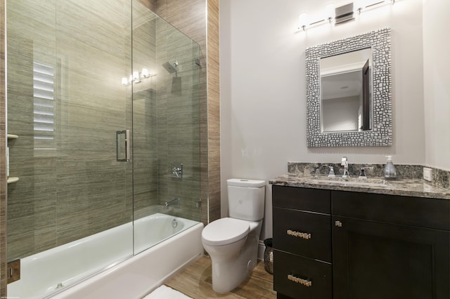 11780 Otter Run, Lake Worth, FL 33449 - bathroom with vanity, combined bath / shower with glass door, toilet, and wood finished floors