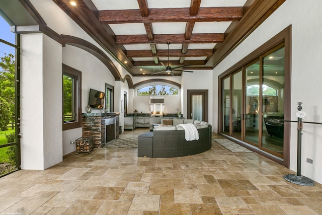 view of patio featuring ceiling fan, an outdoor kitchen, outdoor lounge area, and french doors