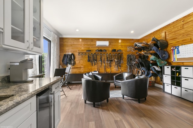 11780 Otter Run, Lake Worth, FL 33449 - living room featuring wooden walls, recessed lighting, crown molding, and light wood finished floors