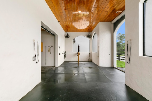 hall featuring wooden ceiling