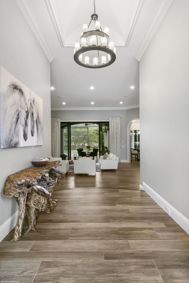11780 Otter Run, Lake Worth, FL 33449 - foyer with crown molding, arched walkways, a notable chandelier, and recessed lighting