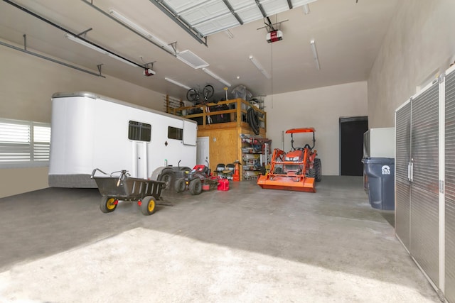 11780 Otter Run, Lake Worth, FL 33449 - garage featuring a garage door opener