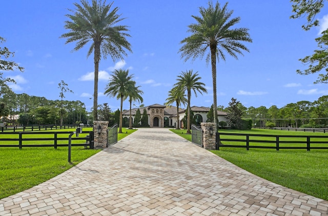 11780 Otter Run, Lake Worth, FL 33449 - view of road featuring a gate, a gated entry, and driveway