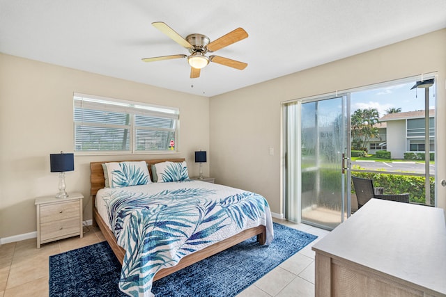 tiled bedroom featuring ceiling fan and access to exterior