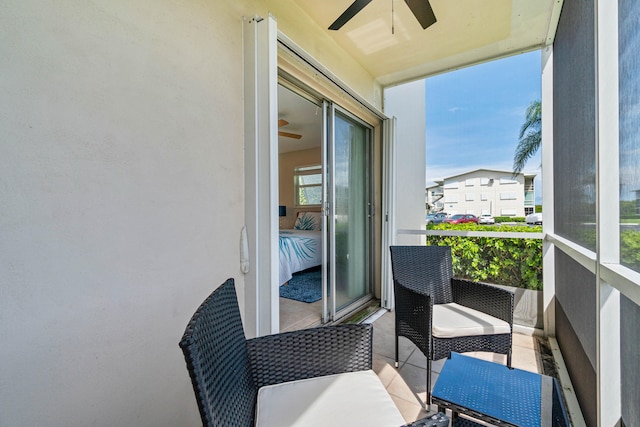 balcony featuring ceiling fan