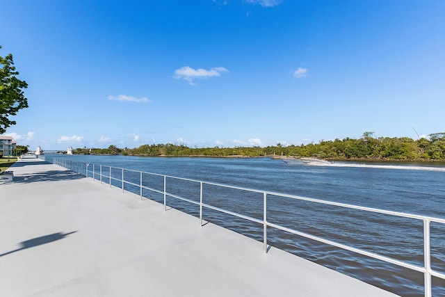 view of patio with a water view