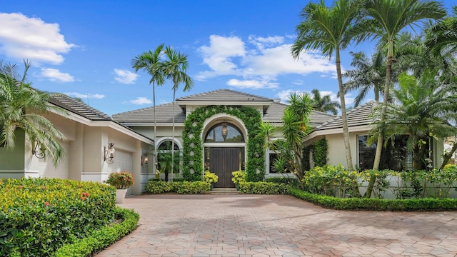 entrance to property featuring a garage