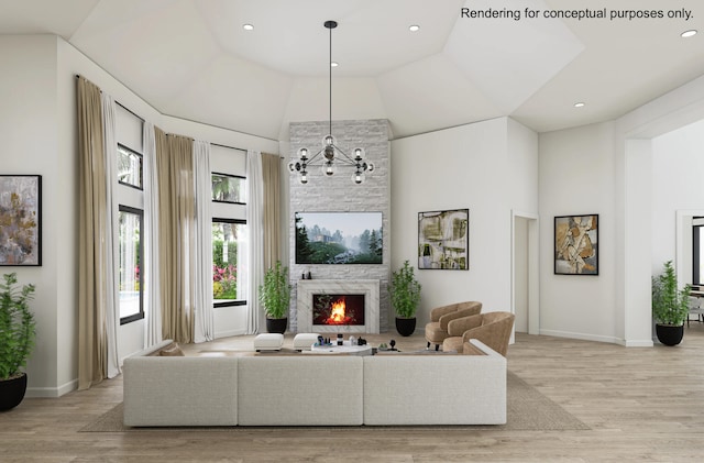 living room featuring light hardwood / wood-style floors, a notable chandelier, high vaulted ceiling, and a fireplace