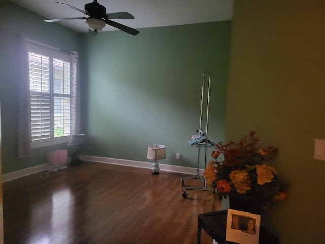 unfurnished room with hardwood / wood-style floors and ceiling fan