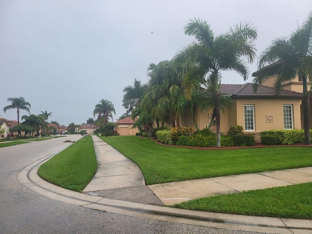 view of home's exterior featuring a yard