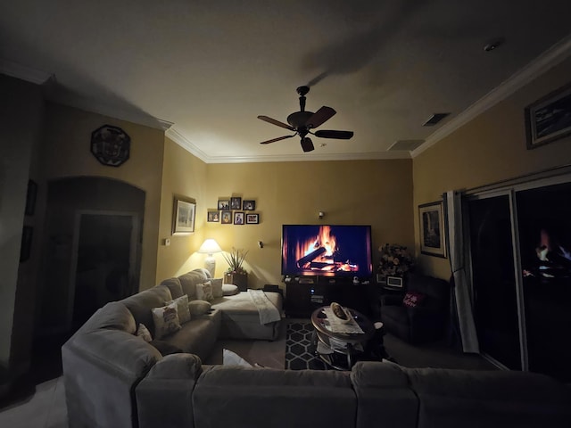 living room with crown molding and ceiling fan