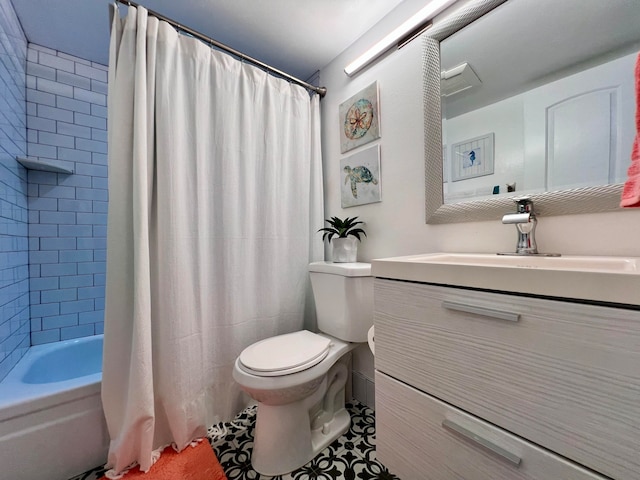 full bathroom featuring tile patterned flooring, vanity, toilet, and shower / bath combination with curtain