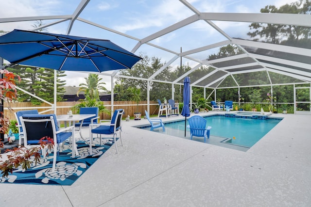 view of pool featuring a lanai and a patio