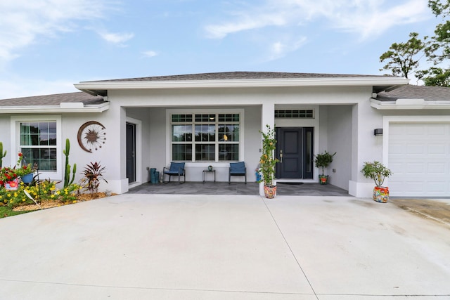 view of front of property with a garage