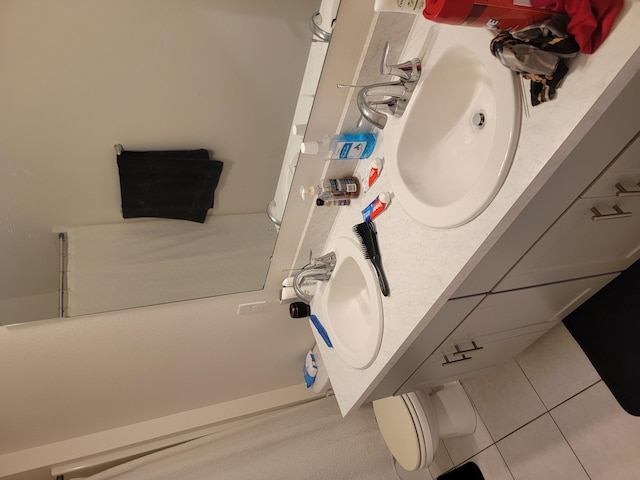 bathroom with vanity and tile patterned floors