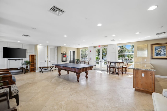 rec room featuring pool table and french doors