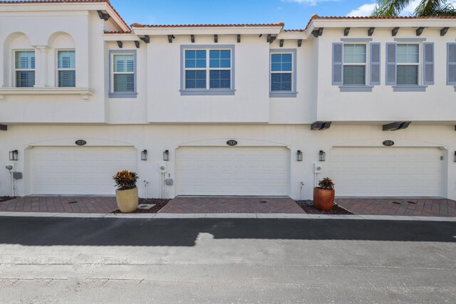 view of front of home with a garage