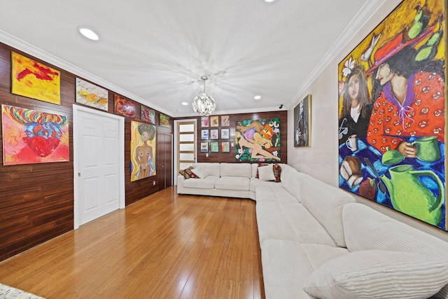 recreation room with crown molding, hardwood / wood-style flooring, a chandelier, and recessed lighting