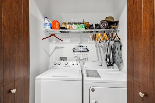 laundry area with washing machine and dryer