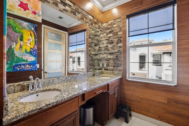 bathroom featuring crown molding, vanity, and tile patterned flooring