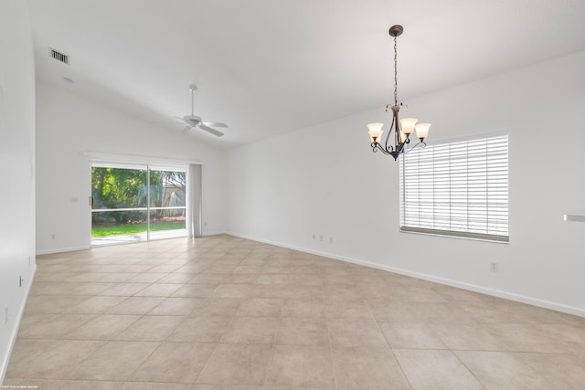 tiled spare room with ceiling fan with notable chandelier and vaulted ceiling