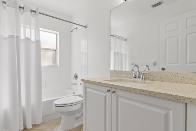 full bathroom with toilet, shower / tub combo with curtain, vanity, and tile patterned floors