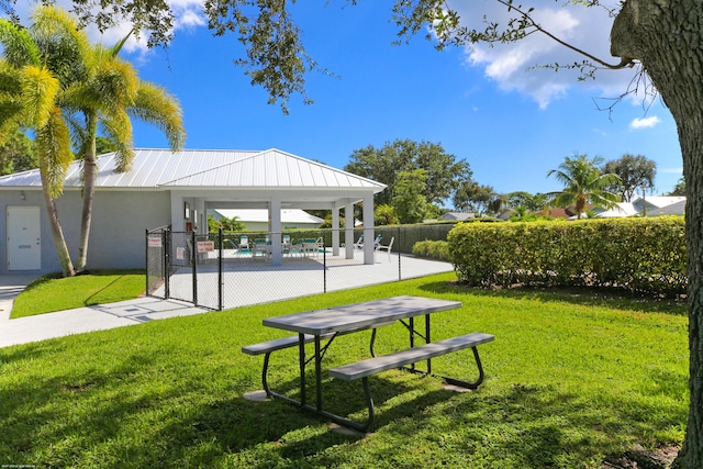 view of property's community with a gazebo, a yard, and a patio area