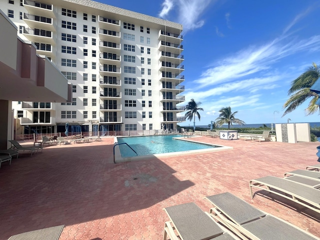 pool featuring a patio area
