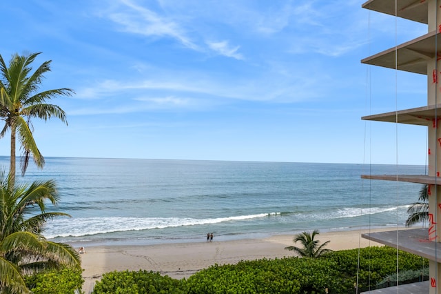 property view of water featuring a beach view