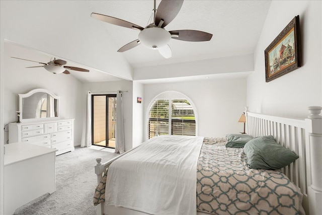 bedroom featuring lofted ceiling, light carpet, ceiling fan, access to exterior, and a textured ceiling