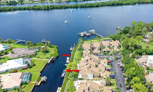 birds eye view of property featuring a water view