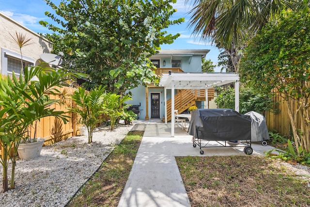 rear view of house with a patio