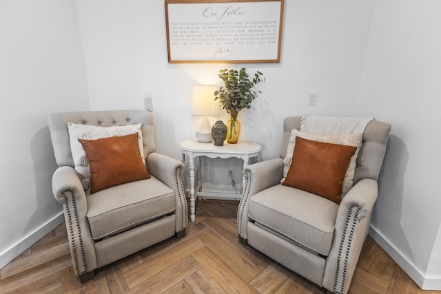 sitting room with parquet flooring