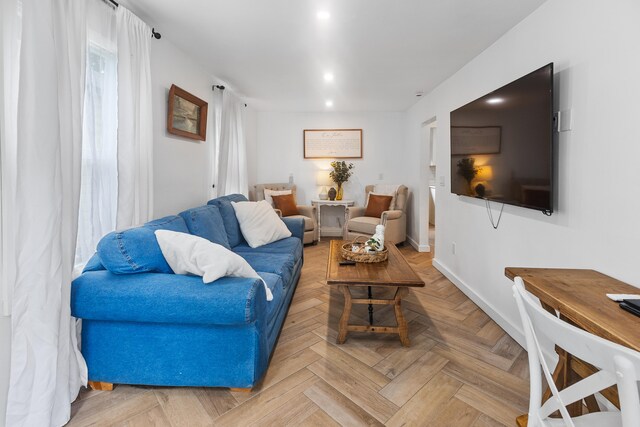 living room featuring light parquet floors