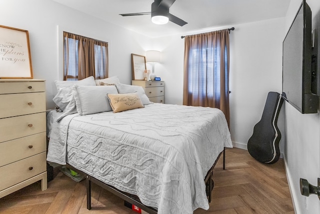 bedroom with parquet flooring and ceiling fan