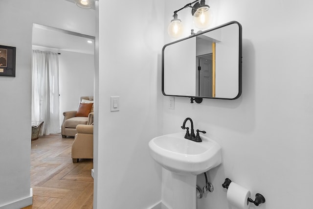 bathroom with parquet flooring