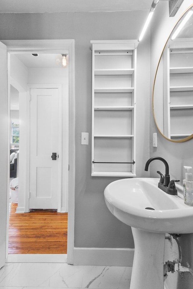 bathroom featuring hardwood / wood-style flooring