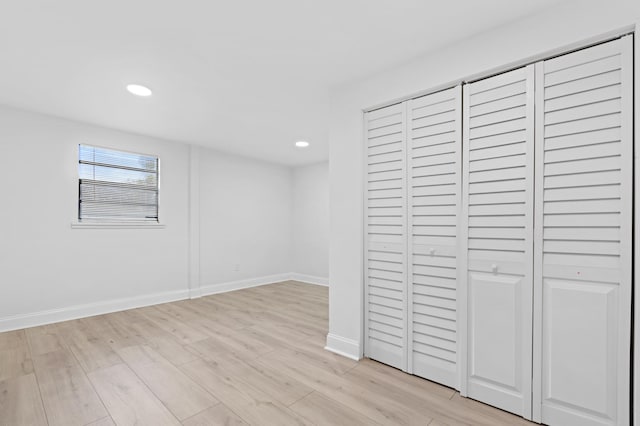 unfurnished bedroom with light hardwood / wood-style floors