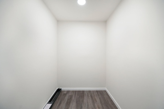 unfurnished room with hardwood / wood-style floors