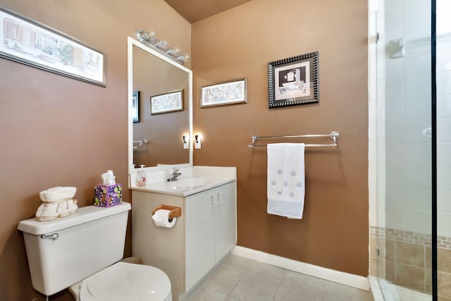 bathroom featuring tile patterned floors, an enclosed shower, vanity, and toilet