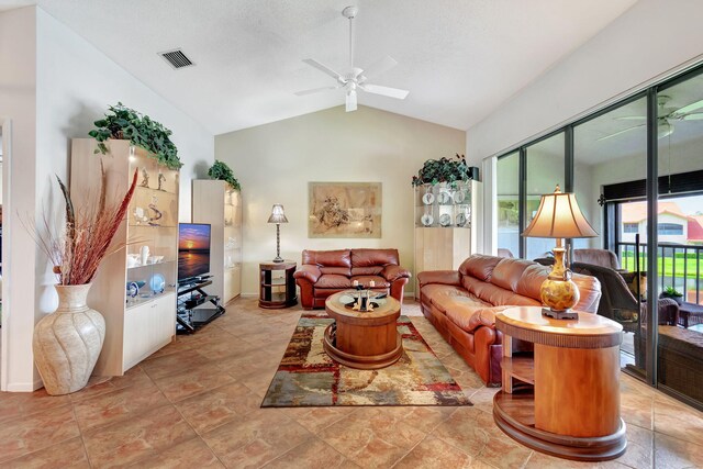 living room with vaulted ceiling and ceiling fan