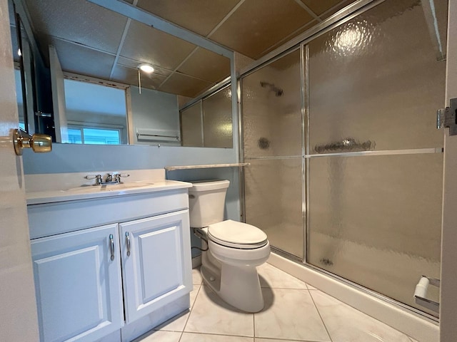 bedroom with stacked washing maching and dryer, light tile patterned flooring, and ceiling fan