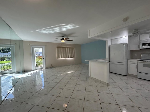 kitchen with light tile patterned flooring, backsplash, white cabinets, white appliances, and ceiling fan