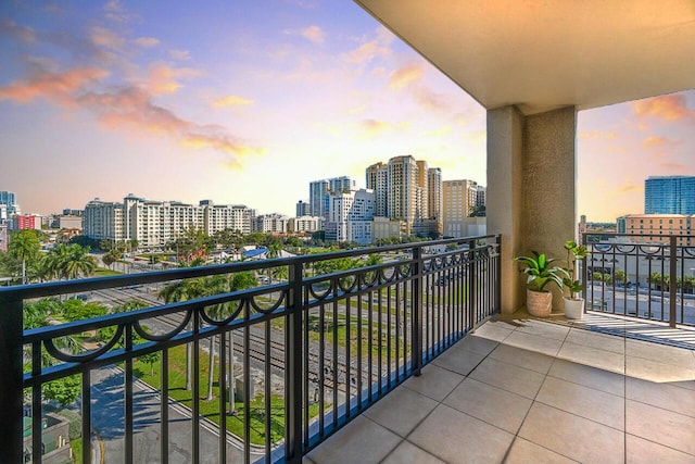 view of balcony at dusk