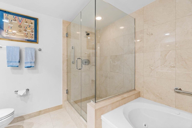 bathroom featuring tile patterned flooring, independent shower and bath, and toilet