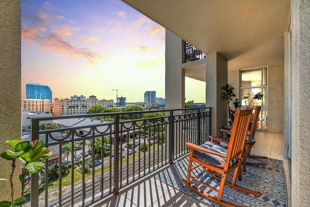 view of balcony at dusk