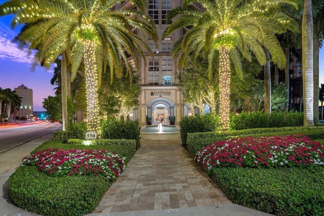 view of exterior entry at dusk