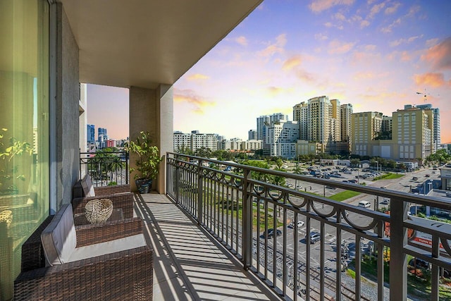 view of balcony at dusk