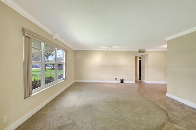 carpeted empty room with crown molding