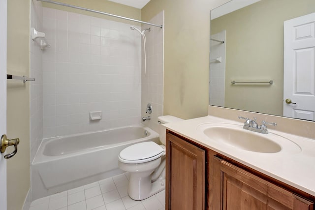 full bathroom with tile patterned flooring, vanity, toilet, and tiled shower / bath